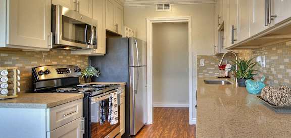 Fully Equipped Kitchen Includes Frost-Free Refrigerator, Electric Range, & Dishwasher at Californian, Mountain View, CA, 94040