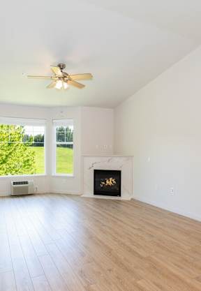 Room with fireplace and Ceiling Fan at Wilsonville Summit Apartments, Wilsonville , Oregon