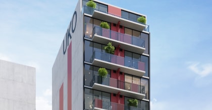 a rendering of a tall building with balconies and plants