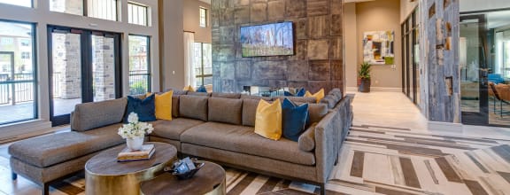 a dining room with a bar and a television