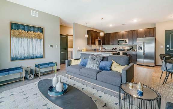 a living room with a couch and a table