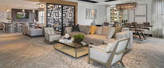 a living room with a couch and a table