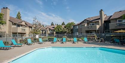 Canterbury Downs Apartments swimming pool and lounge chairs, Roseville, CA, 95678