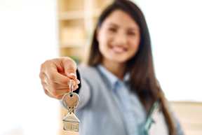 A woman is holding keys at The Edge of Germantown, Memphis, Tennessee