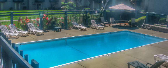 Clearwater Square Apartments Pool Area and Lounge Chairs
