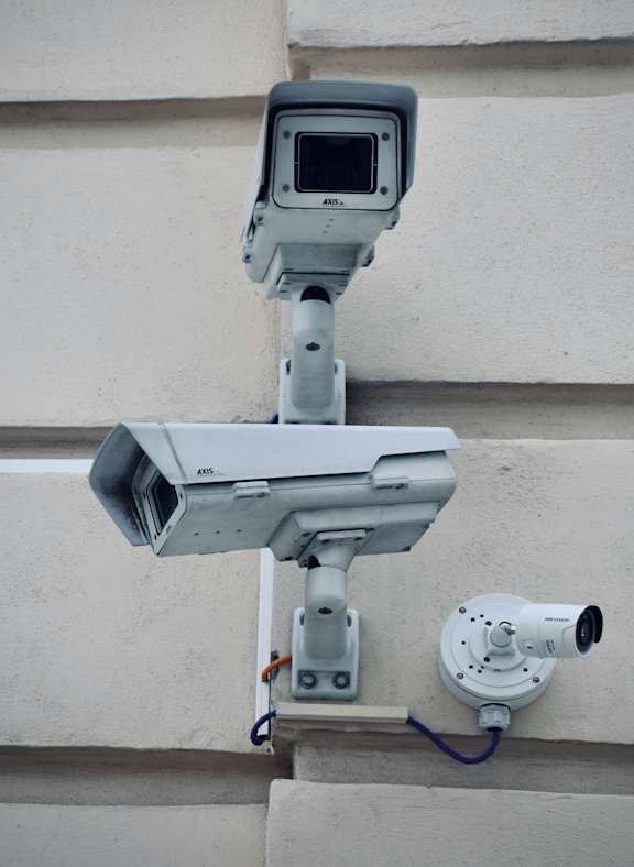 Security camera system on building exterior at Mac and Mullen Apartments, Edmonton, Alberta