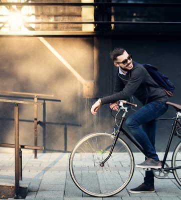 Guy in Sunglasses on a Bike