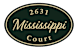 A green oval sign with the words Mississippi Court and the number 2631.