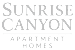 A black and white image of a logo for Sunrise Canyon Apartment Homes.