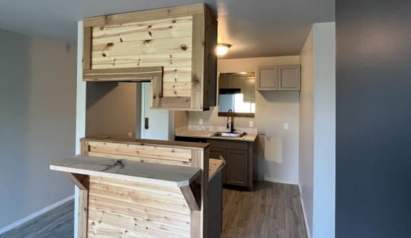 a view of the kitchen from the living room at The Lodge Apartments, Tulsa, OK