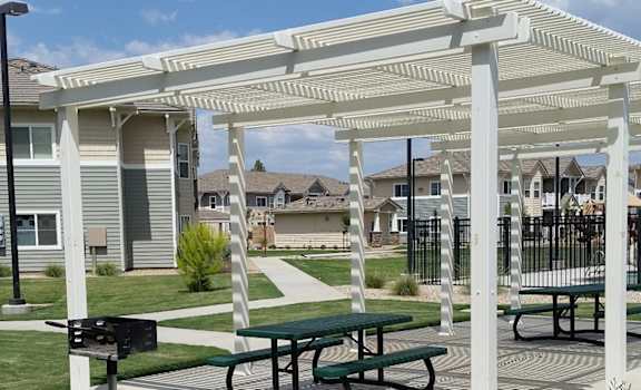 Image of patio picnic area on property lawn