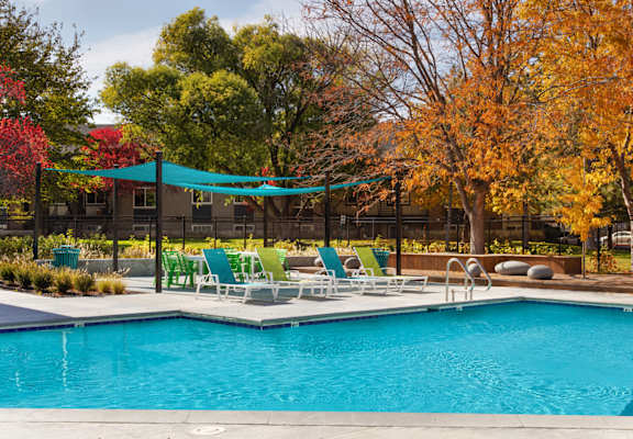 The Grove Apartments Pool Area and Lounge Chairs