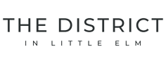 A black background with white text that reads "The District in Little Elm".