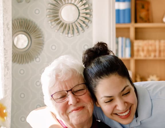 Resident with memory care team member