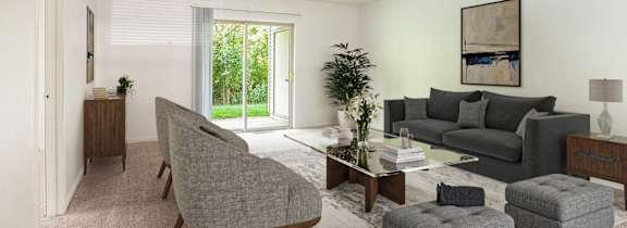 a living room with couches and chairs and a table