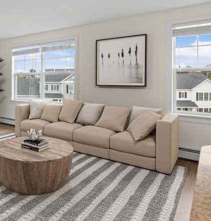 a living room with a couch and a coffee table