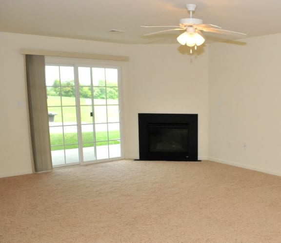 Gas fireplace, living room with ceiling fan
