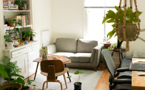 a living room with a couch and a table