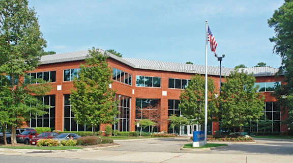 a building with an flag in front of it