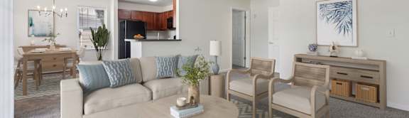 A living room with a couch, chairs, and a coffee table.