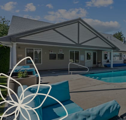 our apartments have a pool and lounge furniture in the yard