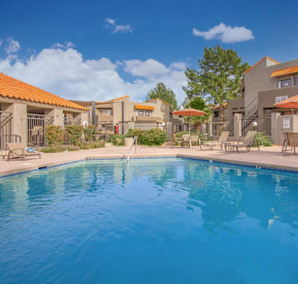 Metro on First Apartments in Tucson, Arizona Exterior and Pool with Lounge Chairs