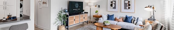 Living room with seating, TV and coffee table