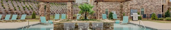 Poolside Grilling Area at Patriot Park Apartment Homes in Fayetteville, NC,28311