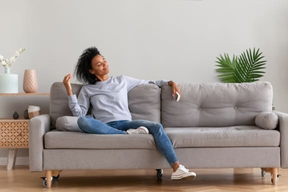 Woman Sitting on the Couch at Green Street, Brookline