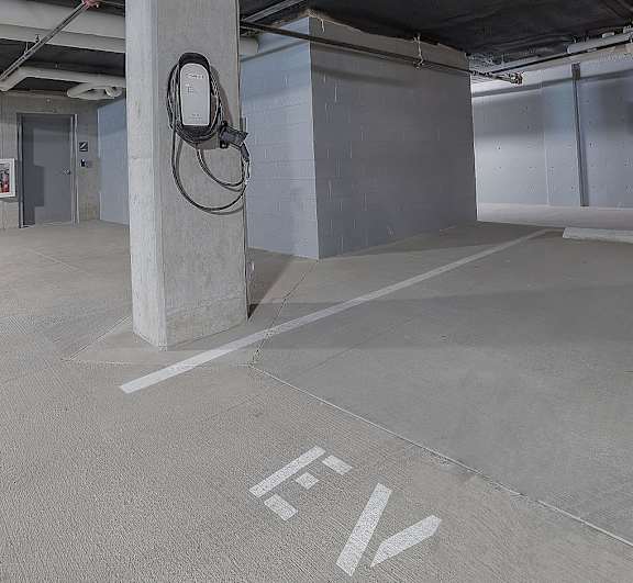 A parking garage with the letters