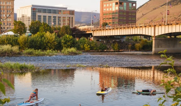 a group of people paddle down the yakima river in downtown yakimaat Ashlyn Place Apartments, Missoula, MT