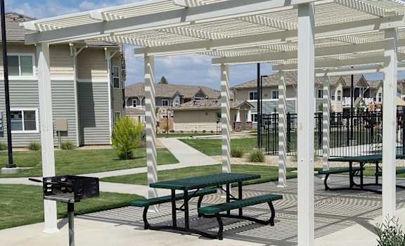 Image of patio picnic area on property lawn