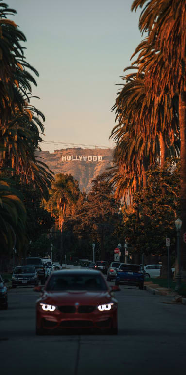 Cruisin' through Los Angeles with Hollywood sign in the distance
