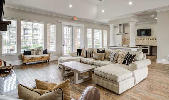 a living room with a couch and a table