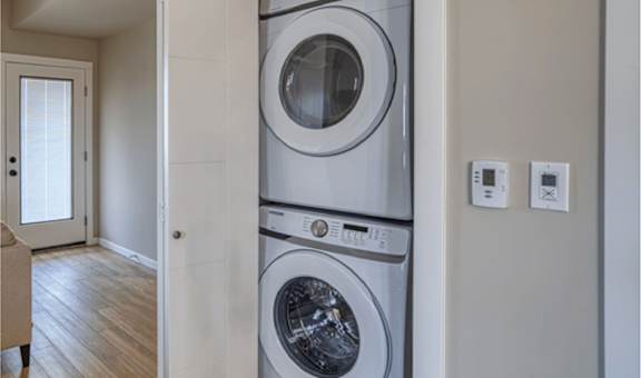 Stacked Washer Dryer at Vista Apartments at Edgemont, Alberta