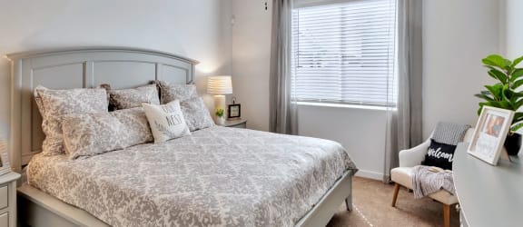 a bedroom with a bed and a ceiling fan at Parke Place, Prescott Valley, Arizona