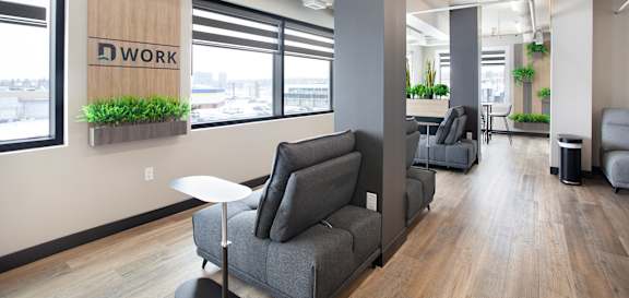 A modern office space with a sign that reads