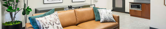 a living room with a couch and a table