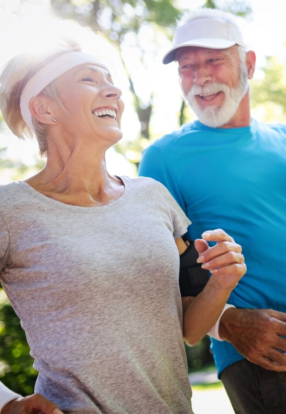 This is a photo of an older active couple running.  at Village East, Franklin, Ohio