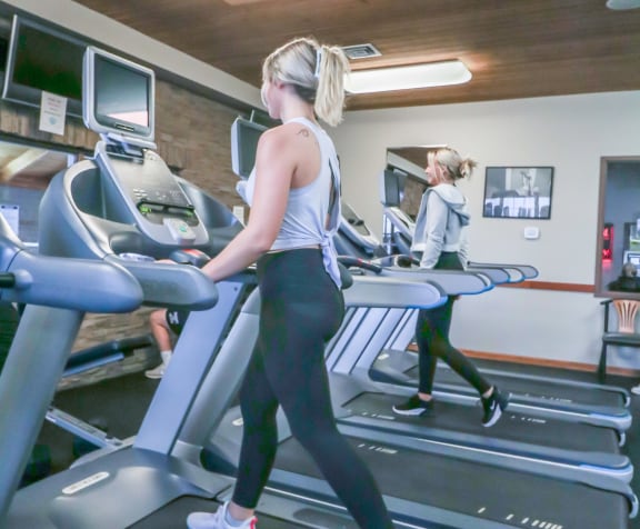 two women running on a treadmill in a gym at Summit Ridge, Duluth, MN