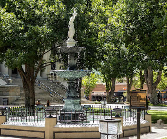 a fountain in the middle of a park at Pines at Prescott Apartments, Prescott, 86305