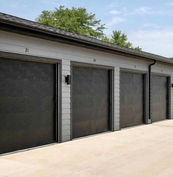 a row of garage doors on a building