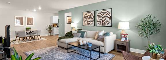 a bedroom with a bed and a ceiling fan