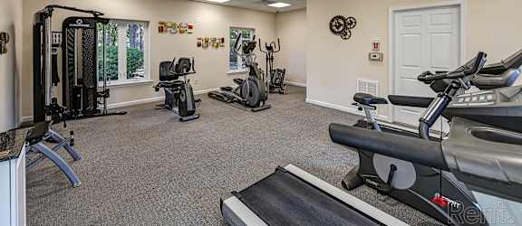 the gym at the enclave at woodbridge apartments in sugar land, tx