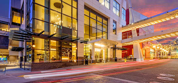 a long exposure of a building at night with a street at Two Lincoln Tower Apartments, Bellevue, WA, 98004