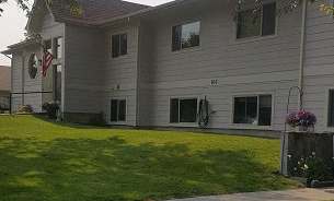 Image of the outside of the building and the lawn