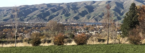 A view of the foothills of the mountains in Idaho in the distance.at Canyon View, Idaho