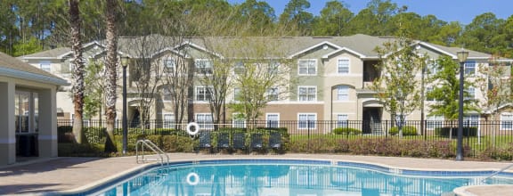 Swimming Pool with clubhouse in the background