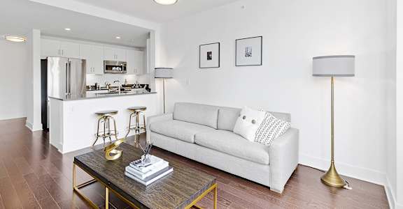 Living room with open kitchen at 65 Bay Street, New Jersey, 07302