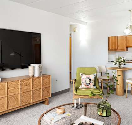 a living room with a couch and a coffee table
